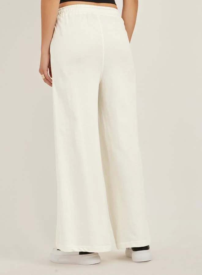 Styli Embossed Hem Wide Leg Joggers with Drawstring Waist