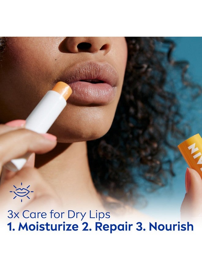NIVEA Mango Lip Care, Vegan Lip Balm Pack with Shea Butter, Nourishing Oils and Vitamin C & E, 3-in-1 Moisturize, Repair (for Dry Lips) and Protect, 0.17 Oz Stick, Pack of 4 - Image 3