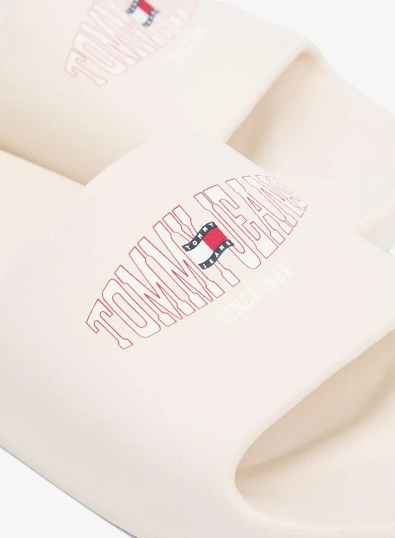 Tommy Jeans Newsprint Wavy Flag Logo Slides for Men | Best Price UAE