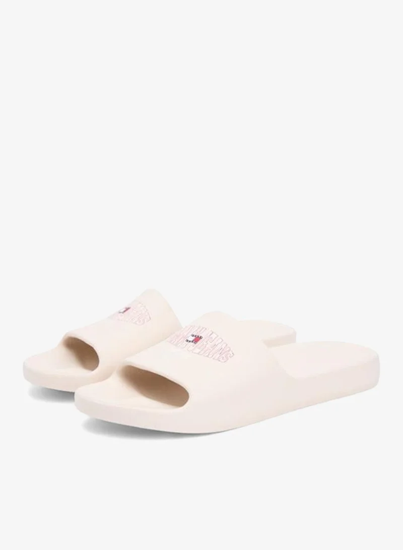 Tommy Jeans Newsprint Wavy Flag Logo Slides for Men | Best Price UAE