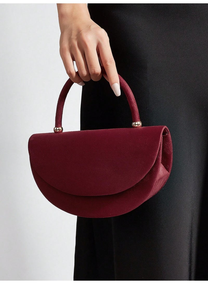 حقيبة سهرة نسائية أنيقة باللون العنابي بتصميم عصري - Image 1