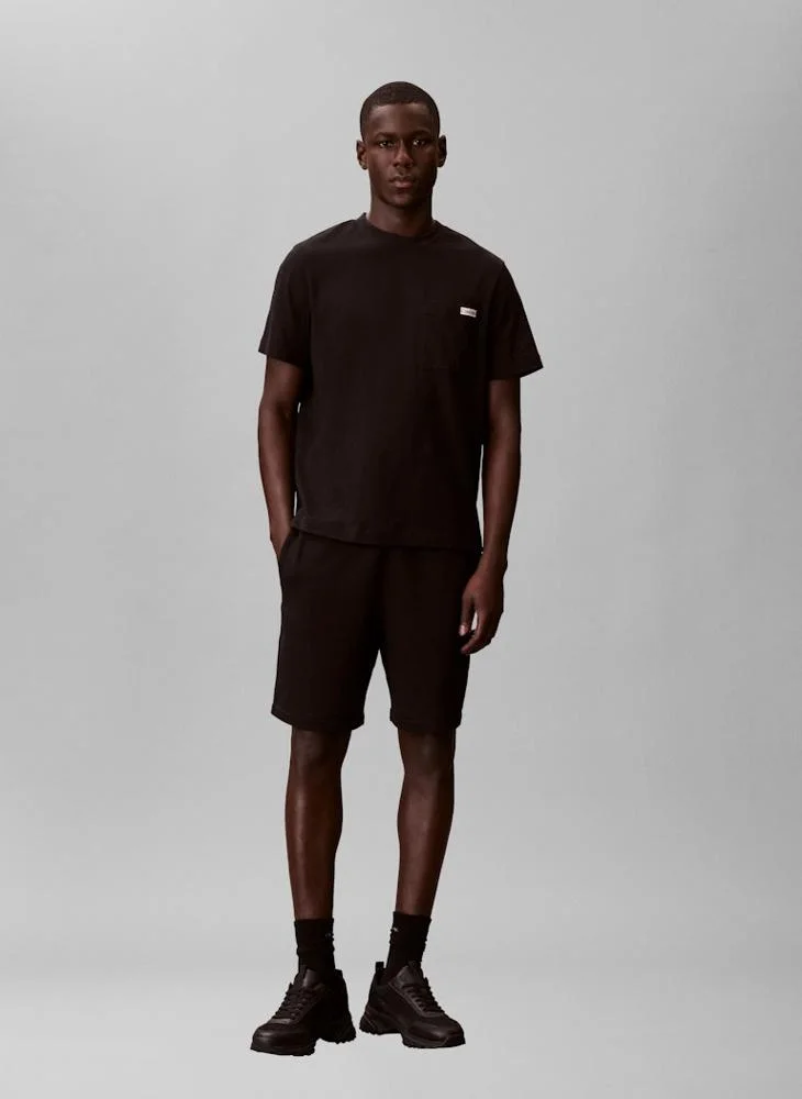 Calvin Klein Jeans  Cotton Terry Badge Jogger Shorts for Men | Best Price UAE