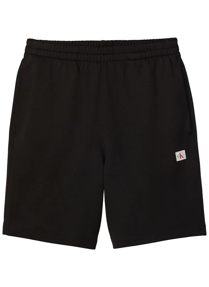 Calvin Klein Jeans  Cotton Terry Badge Jogger Shorts for Men | Best Price UAE