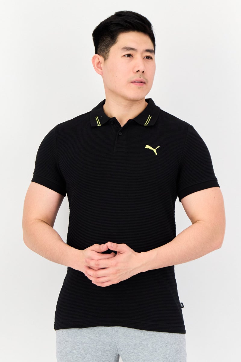 PUMA قميص بولو جولف للرجال بقصة ضيقة بأكمام قصيرة، أسود - Image 1