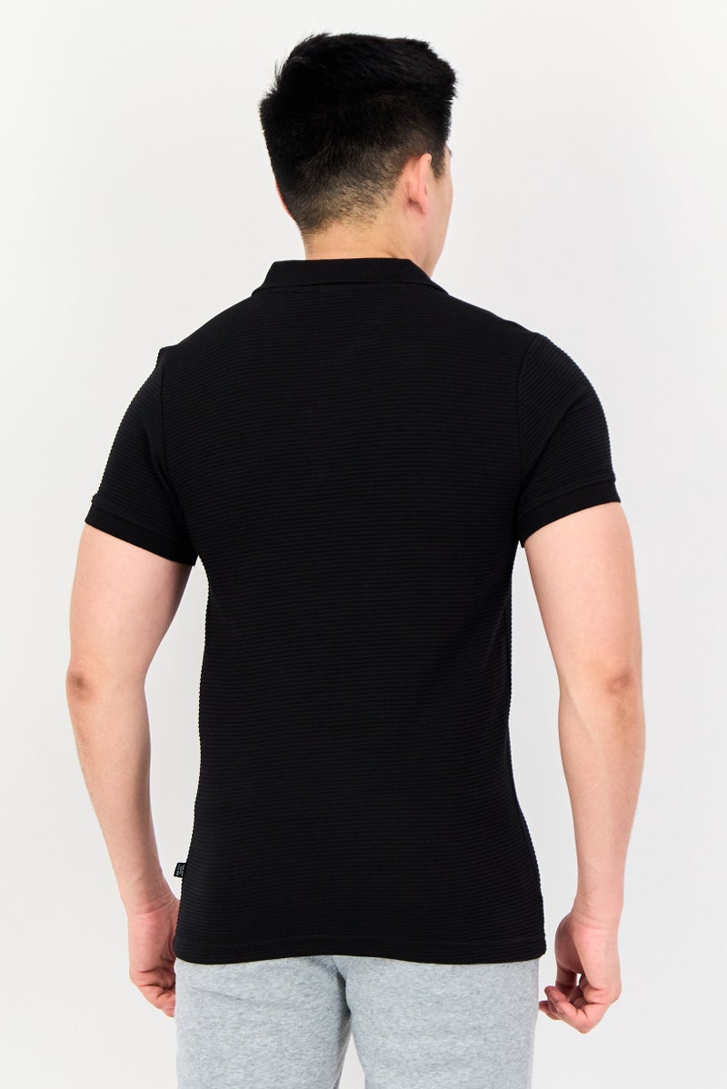 PUMA قميص بولو جولف للرجال بقصة ضيقة بأكمام قصيرة، أسود - Image 4