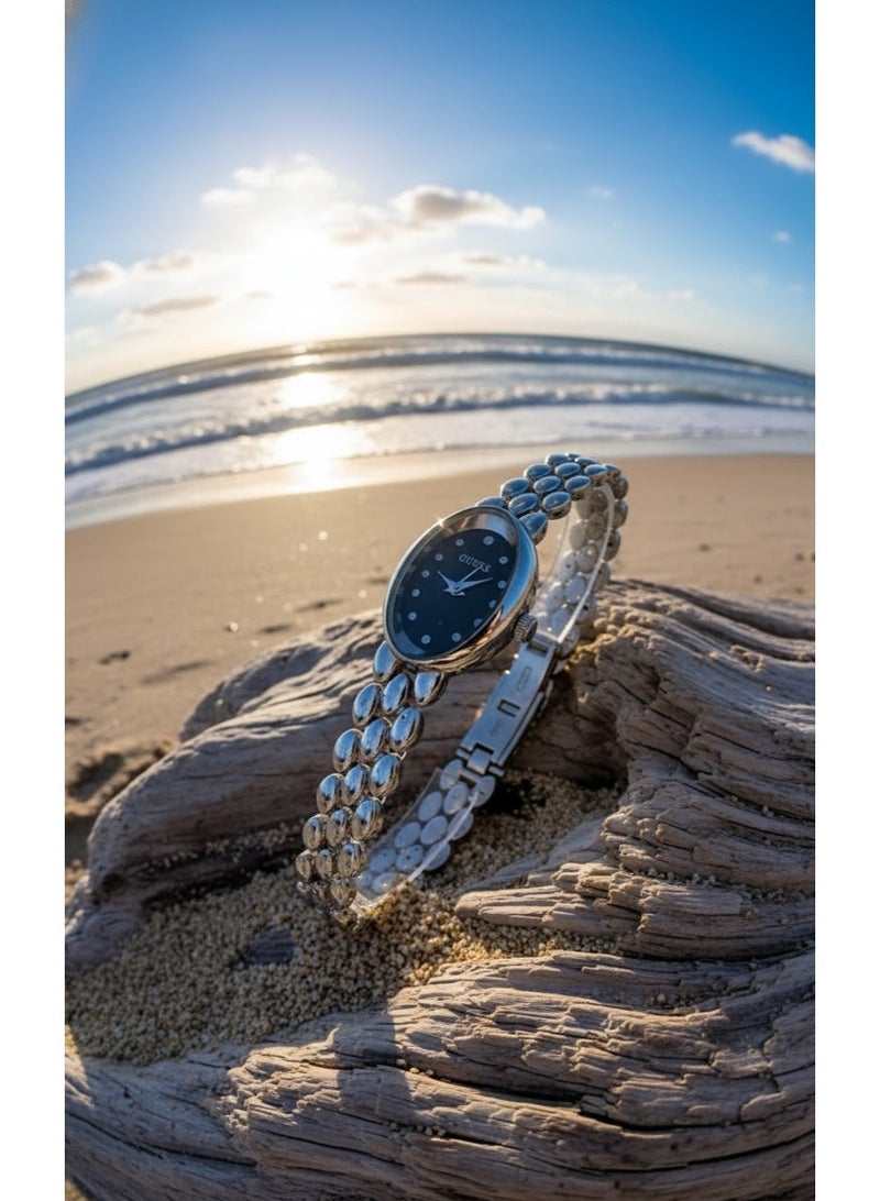 GUESS Women's Oval Silver Watch - Black Dial with Studded Accents - Elegant Fashion Accessory - Image 3