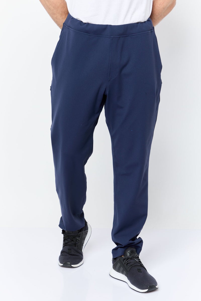 SKECHERS Men Tapered Fit Plain Walking Track Pants, Navy Blue - Image 1