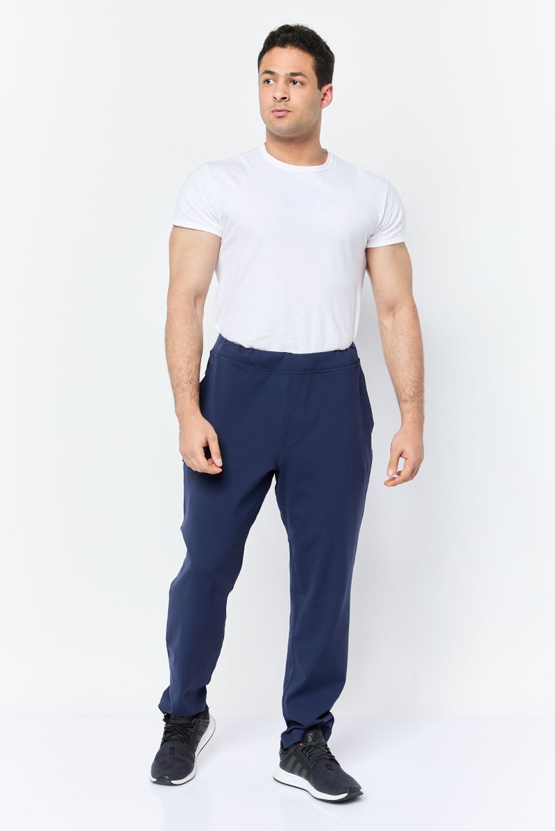 SKECHERS Men Tapered Fit Plain Walking Track Pants, Navy Blue - Image 3