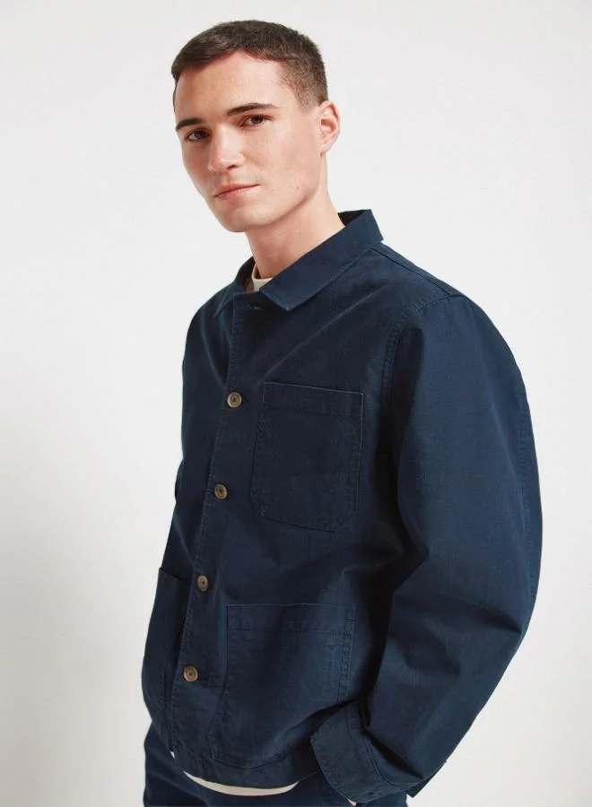 Springfield  Washed cotton fabric overshirt with button fastening, shirt collar, patch pockets, inner pocket, and decorative label detail. for Men | Best Price UAE