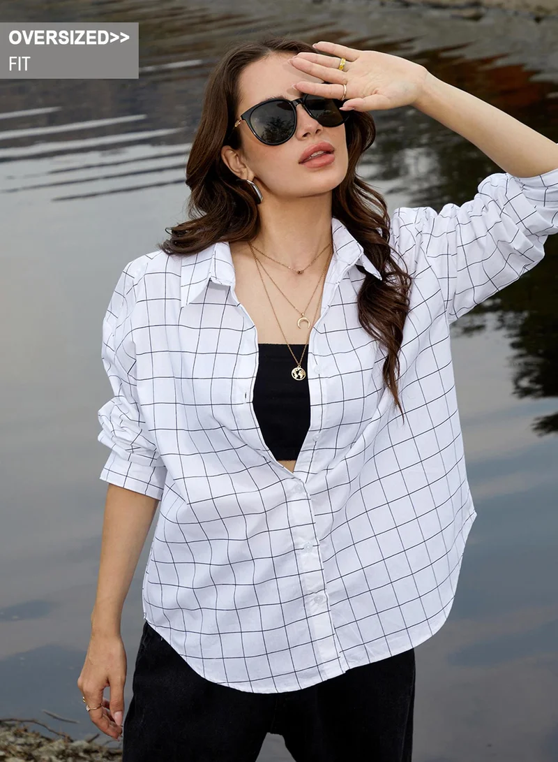 Campus Sutra Campus Sutra Women's Daisy White Graph Check Oversized Shirt For Casual Wear | Spread Collar | Long Sleeve | Button Closure | Oversized Shirt Crafted With Comfort Fit For Everyday Wear