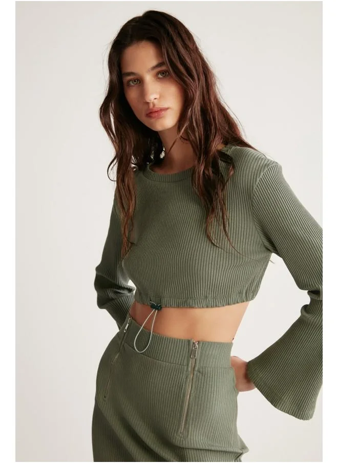 GRIMELANGE Grimelange Darlene Women's Ribbed Stretch Fabric Flare Sleeve Elastic Hem Stopper Crop Khaki Blouse
