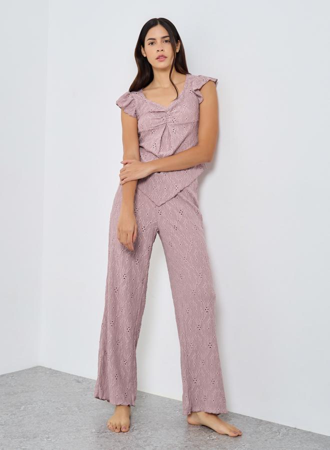 ستايلي طقم من بنطال بيجاما وبلوزة بتفاصيل مُجمعة - Image 1