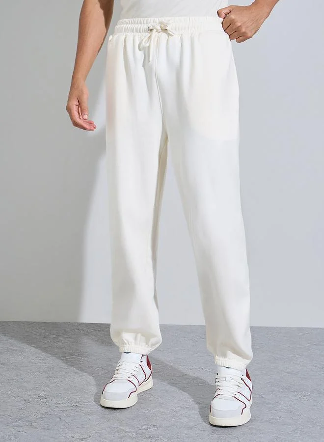 ستايلي Cream Solid Elasticated Hem Relaxed Fit Joggers