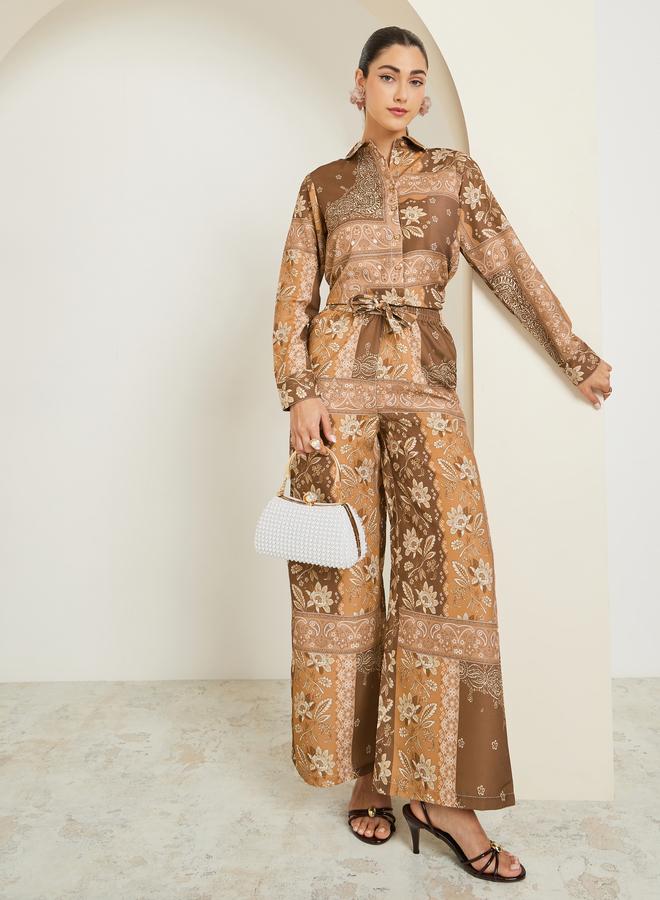 A coordinated set of a printed shirt and wide-leg...
