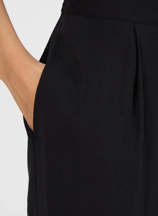 Femmella  Women Black Asymmetric Top with Trousers Co-Ords for Women | Best Price UAE