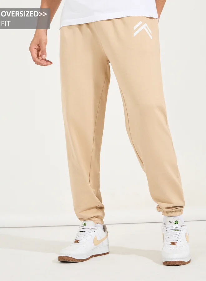 Styli Styli Minimal Print Oversized Joggers with Elasticated Hem
