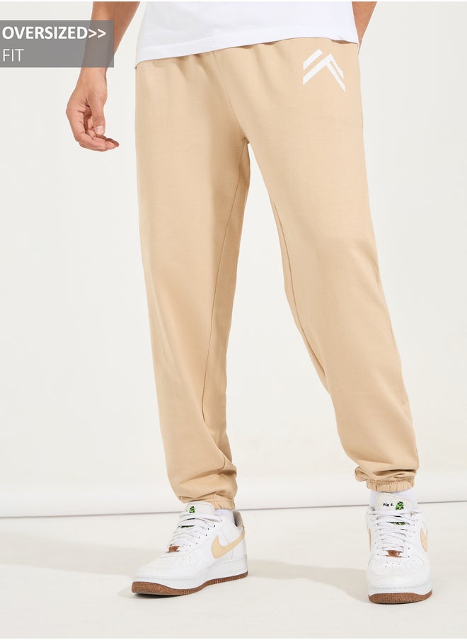 Styli Styli Minimal Print Oversized Joggers with Elasticated Hem  - Image 1