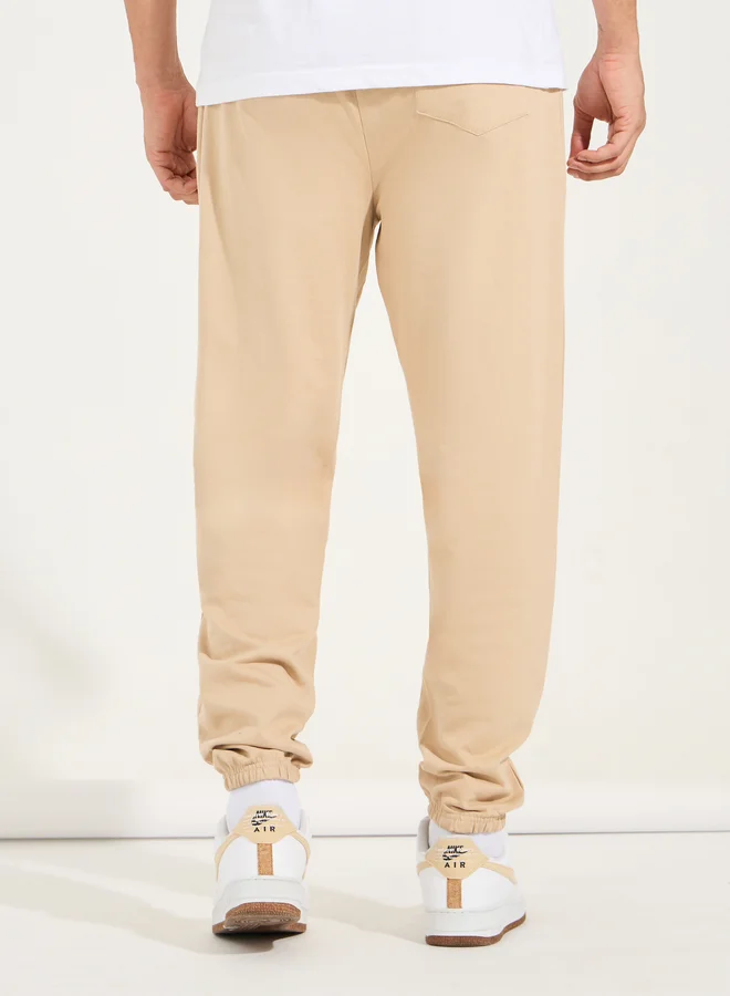 Styli Styli Minimal Print Oversized Joggers with Elasticated Hem