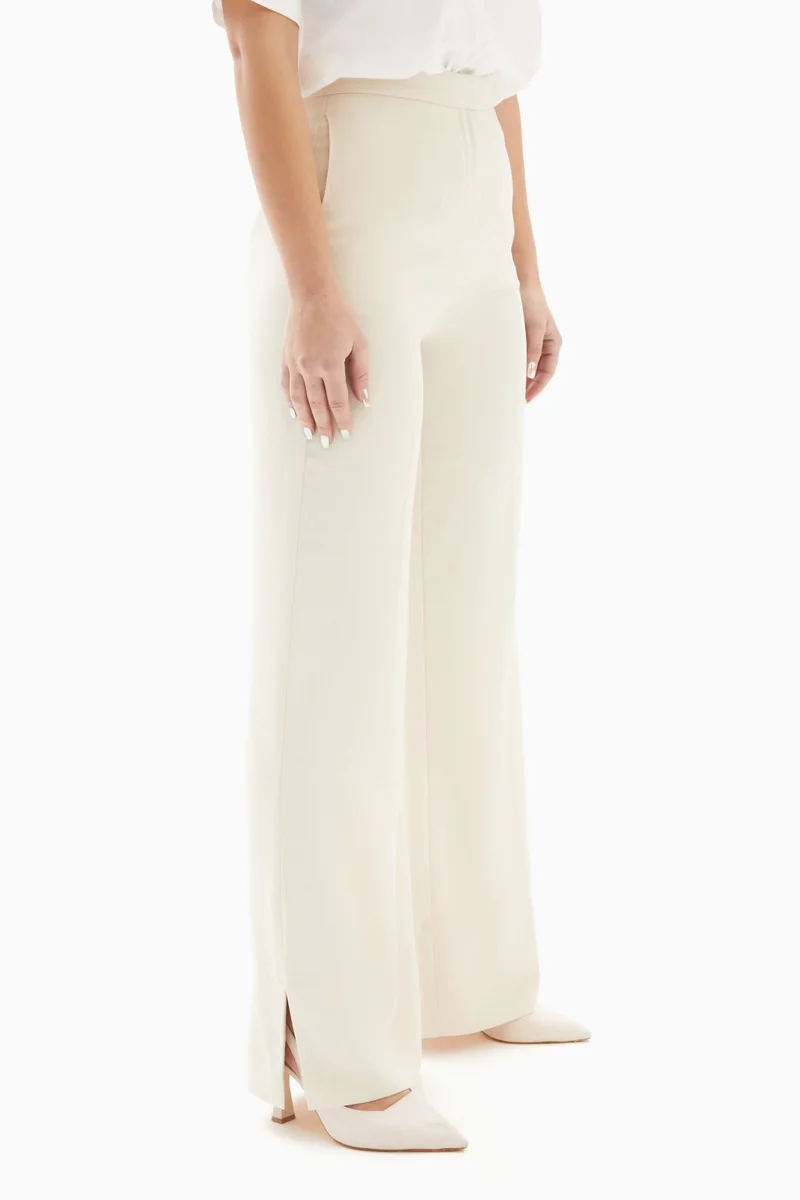Wecre8 Off-White Plain Trousers By WECRE8