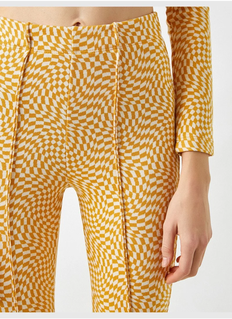 KOTON Patterned Slit Leg Flared Trousers