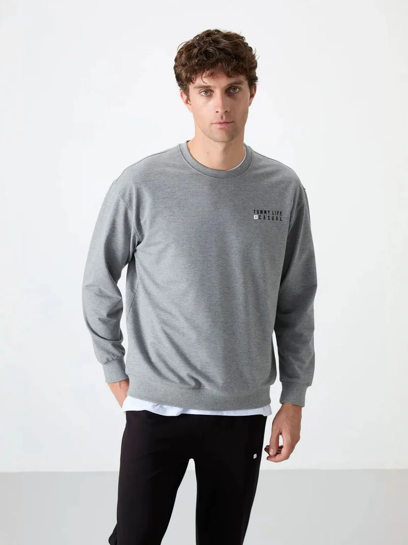 تومي لايف TOMMY Men's Oversized Sweatshirt And Pants Set