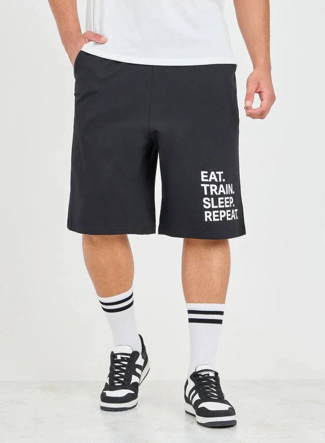 ستايلي Oversized Slogan Print Hem Terry Athleisure Shorts