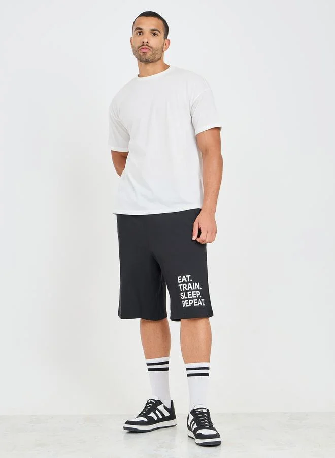 ستايلي Oversized Slogan Print Hem Terry Athleisure Shorts