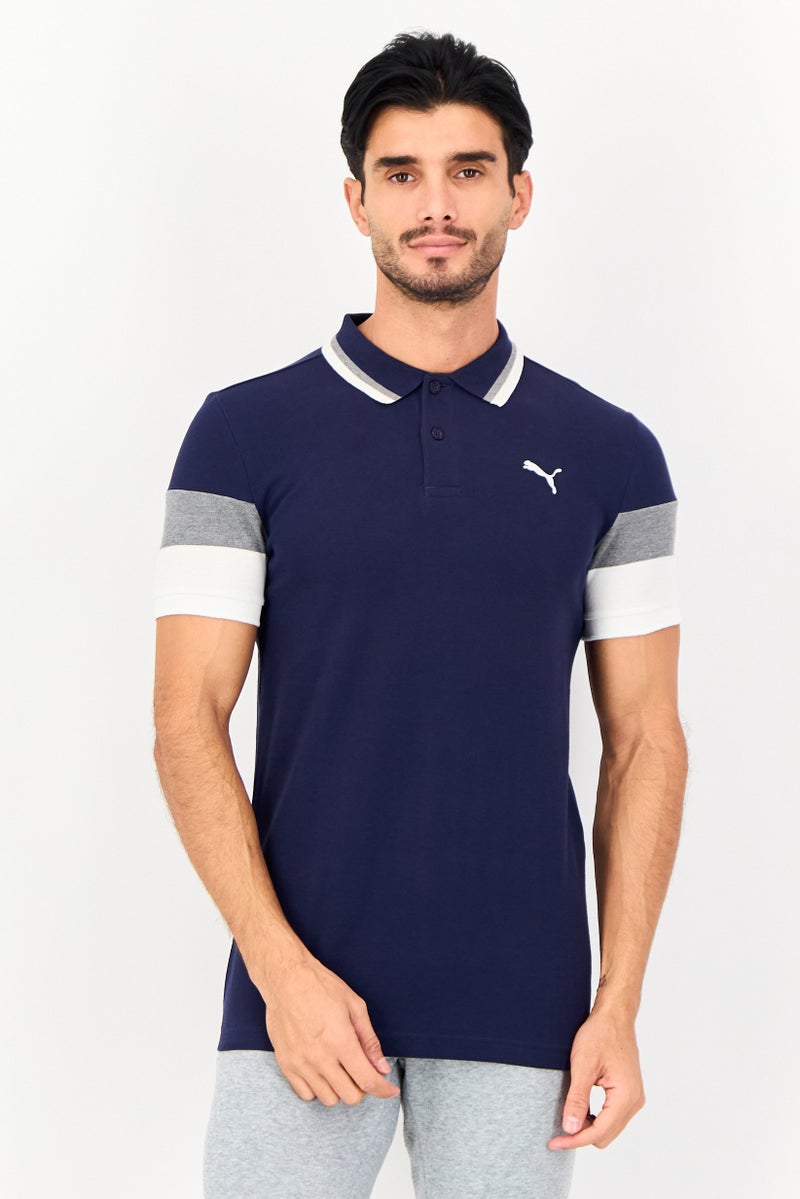 PUMA Men Sportswear Fit Short Sleeve Outdoor Polo Shirt, Navy Blue - Image 1