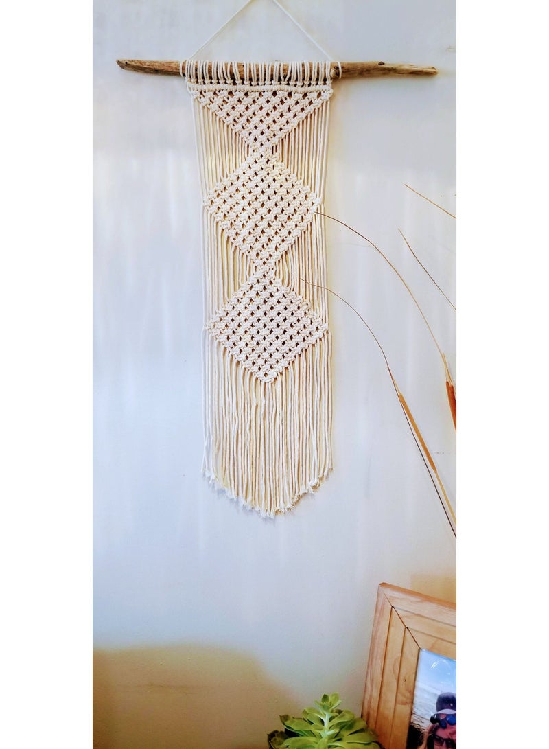 Antikiano handmade macrame piece made of cotton threads. It has a simple and beautiful design that adds a special decorative touch to any room. Perfect for hanging on the wall in bedrooms or living rooms, and makes a lovely gift for handmade item lovers. - Image 1