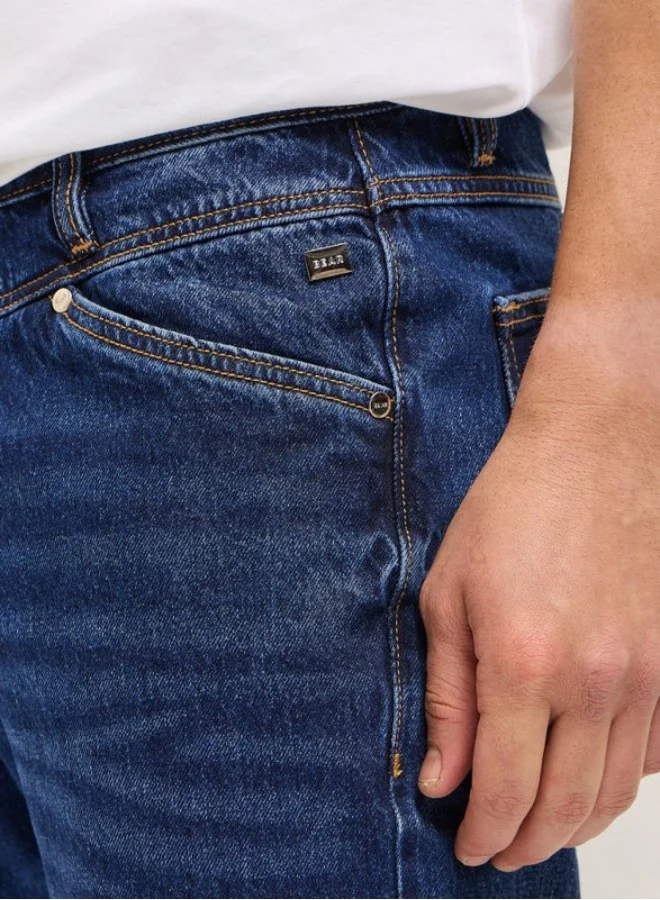 The Bear House  Men's Blue with Light Fade Distressed Patch Mid-Rise Relaxed Fit Jeans Classic Comfort With Modern Style, Perfect For Everyday Casual Looks And Effortless Streetwear Vibes for Men | Best Price UAE
