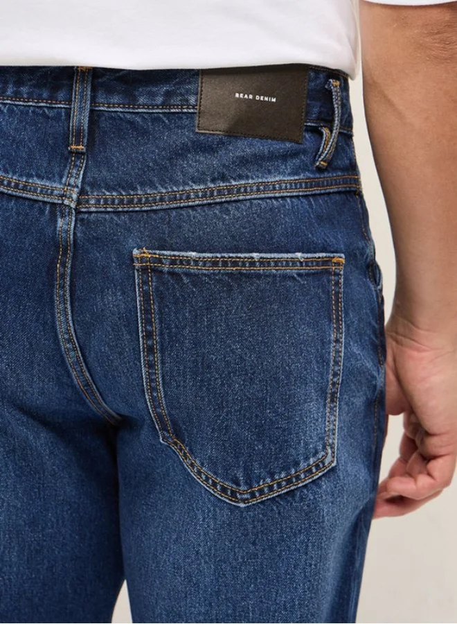 The Bear House  Men's Blue with Light Fade Distressed Patch Mid-Rise Relaxed Fit Jeans Classic Comfort With Modern Style, Perfect For Everyday Casual Looks And Effortless Streetwear Vibes for Men | Best Price UAE