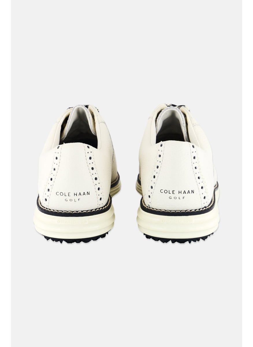 COLE HAAN - Women Medium Og Shortwing Lace Up Golf Shoes, Ivory/Black - Image 1