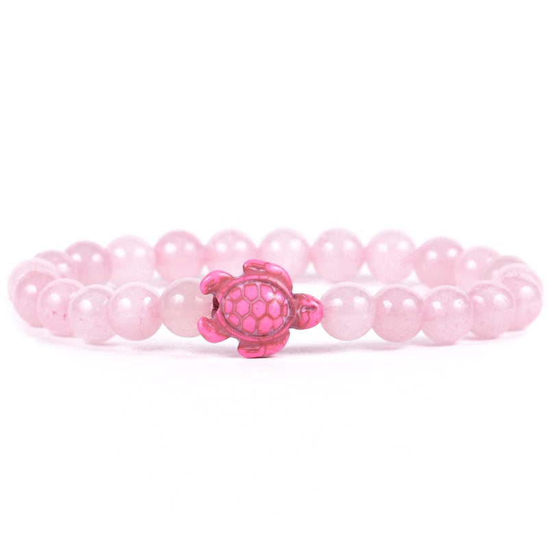Fahlo Sea Turtle Tracking Bracelet, Elastic, Supports The Sea Turtle Conservancy, one Size fits Most for Men and Women (Coral Reef Pink) - Image 1