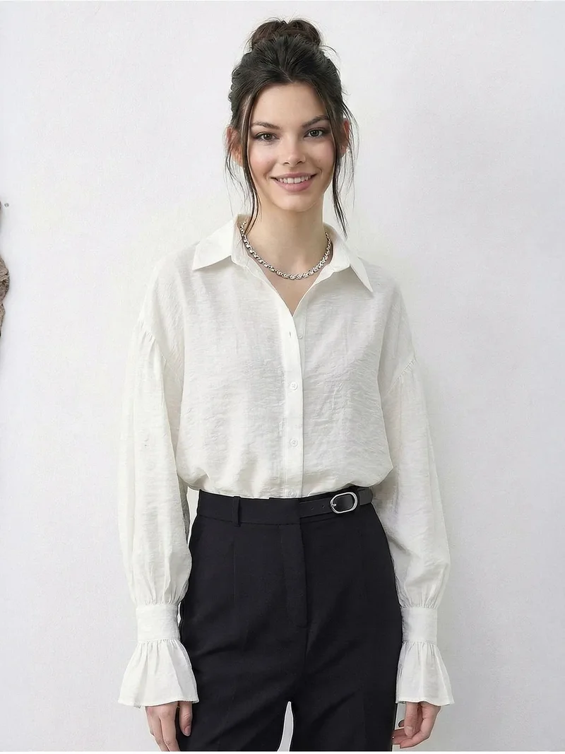 بيانكو لوتشي LUCCI Oversized Frilly Button-Up Shirt