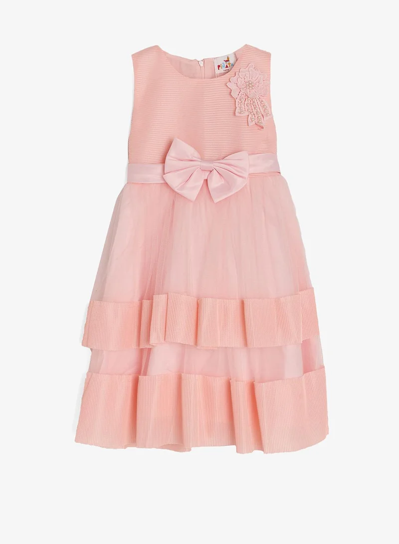 بنياتا فستان بفيونكة للمناسبات