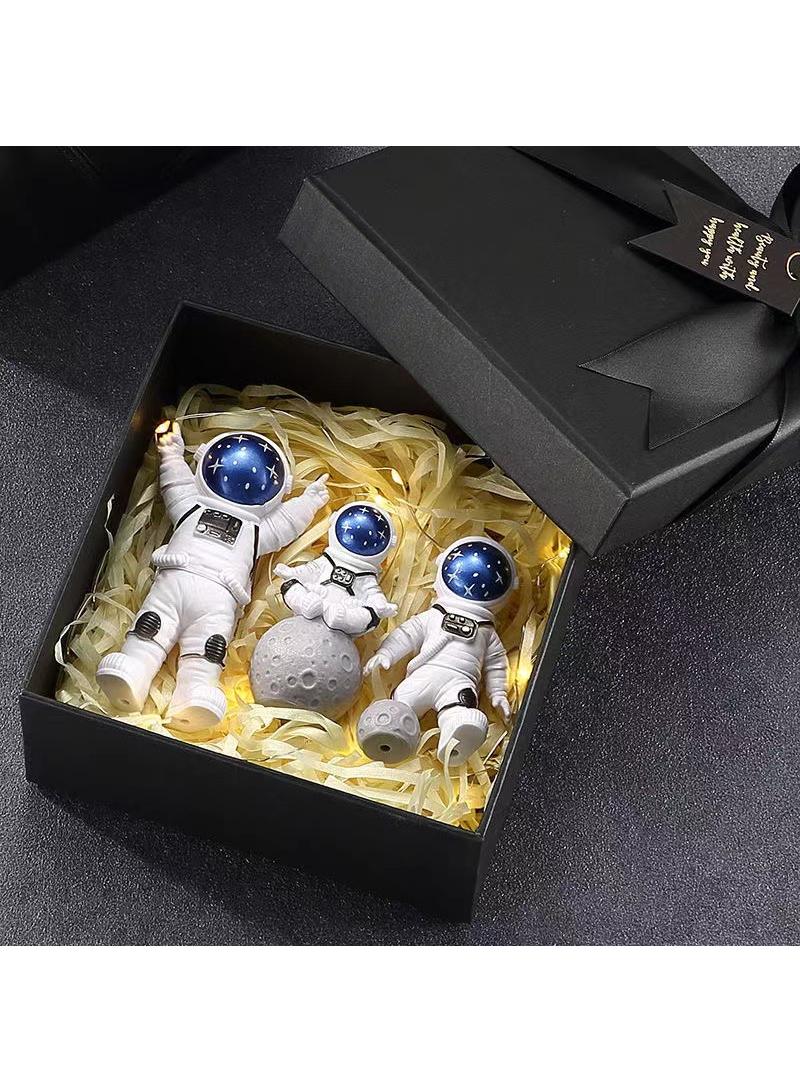 Bluejw 3-Piece Astronaut Figurine Statue Set Astronaut Figure Sculpture For Desktop And Tabletop Decor Resin Spaceman Planet Desk Ornament For Outer Space Themed Bedroom Decor Cake Toppers Decoration Model Set - Image 4