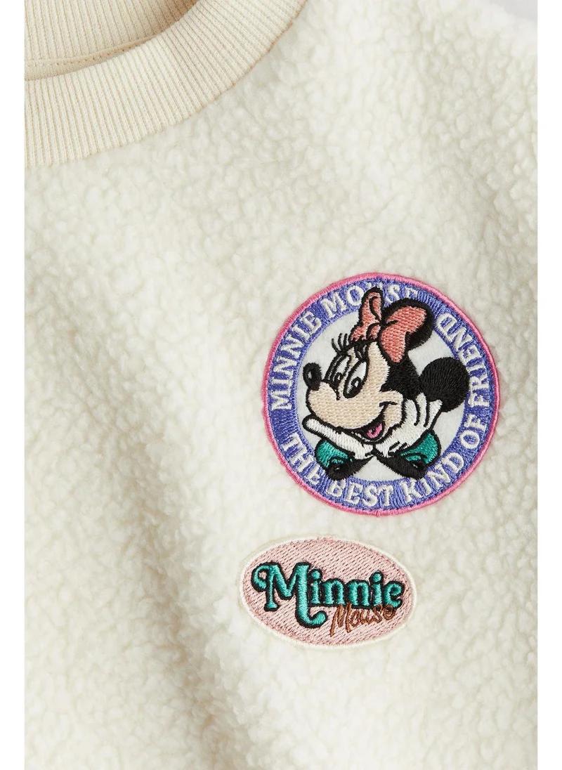 اتش اند ام Appliquéd teddy sweatshirt
