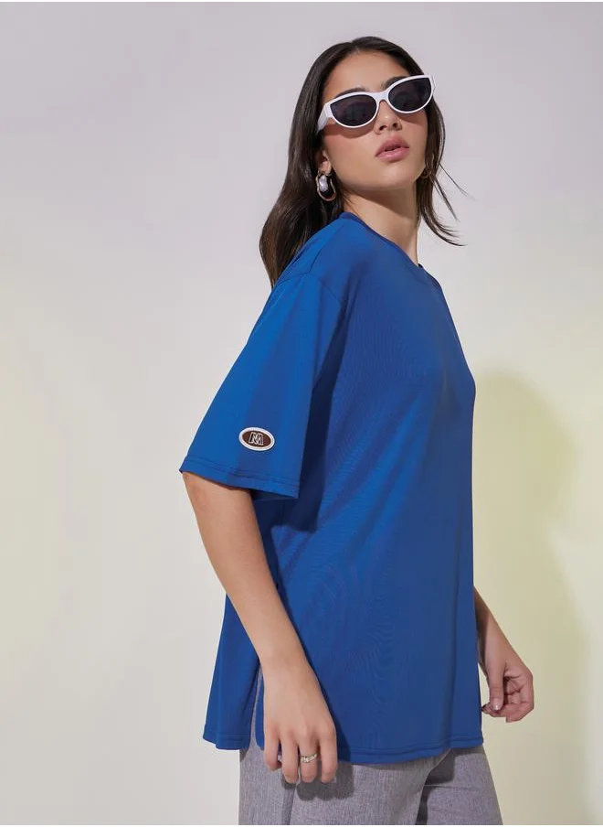 Styli Oversized Round Neck T-Shirt with Patch Detail