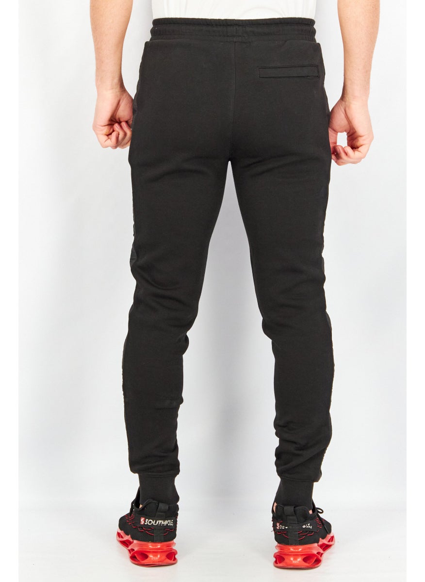 PUMA Puma x Batman Men Sportswear Fit Drawstring Outdoor Track Pants, Black  - Image 3