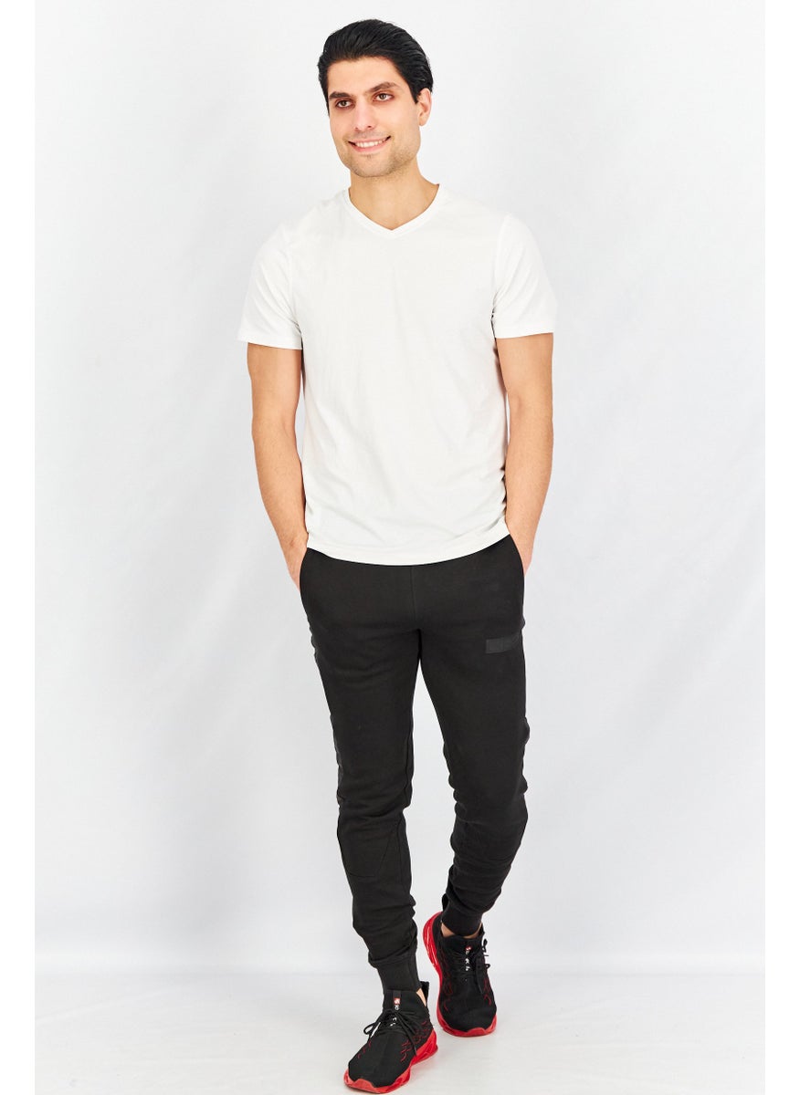 PUMA Puma x Batman Men Sportswear Fit Drawstring Outdoor Track Pants, Black  - Image 2