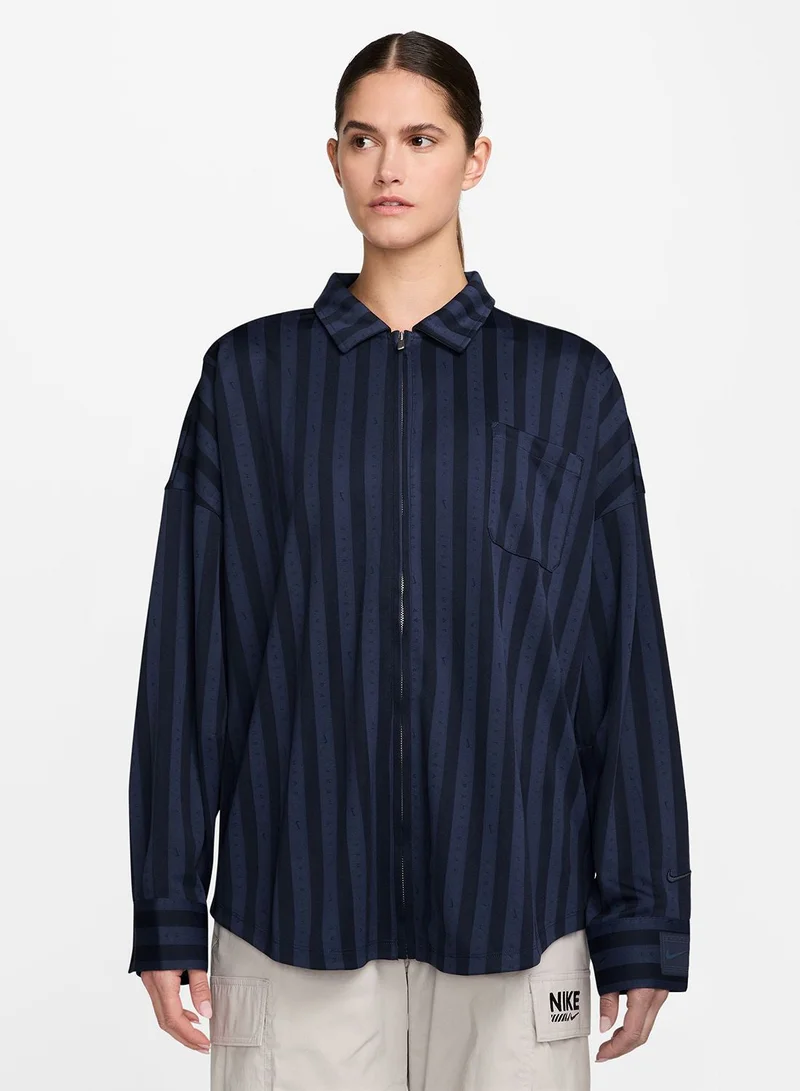 نايكي قميص بأزرار بنقشة الجاكار المخطط