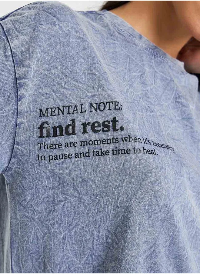 ستايلي Oversized Acid Wash Slogan Print T-shirt