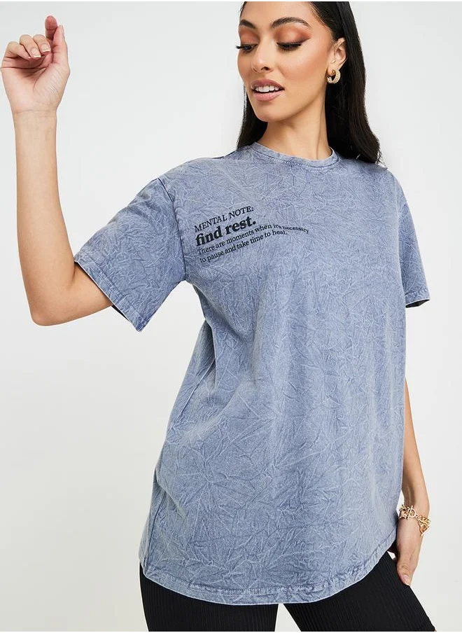 ستايلي Oversized Acid Wash Slogan Print T-shirt
