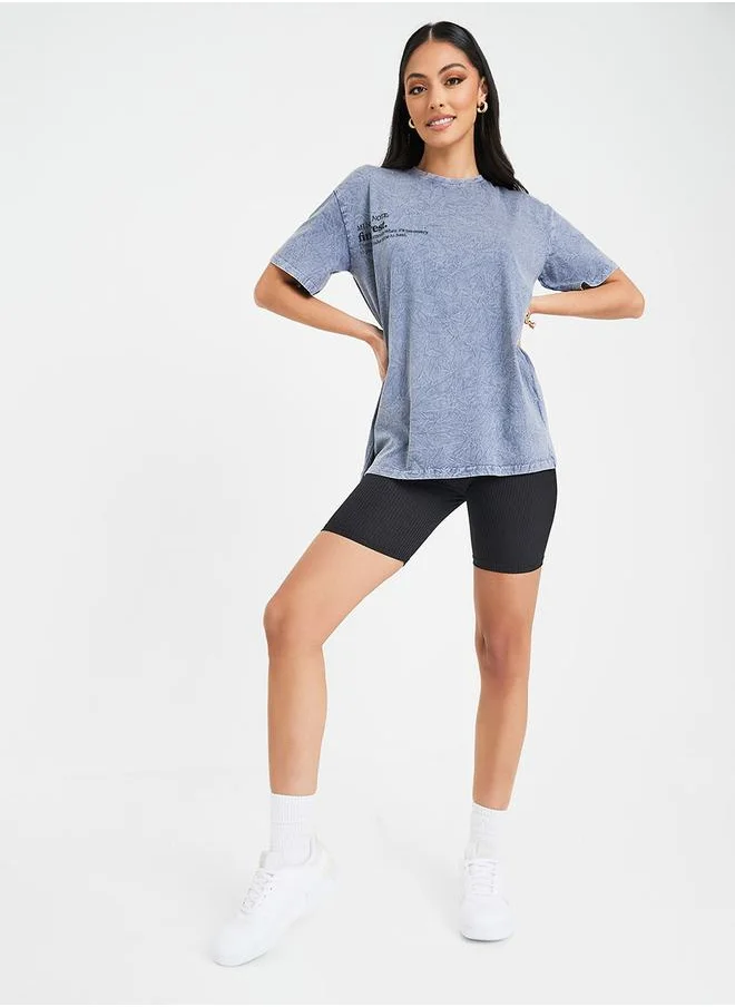 ستايلي Oversized Acid Wash Slogan Print T-shirt