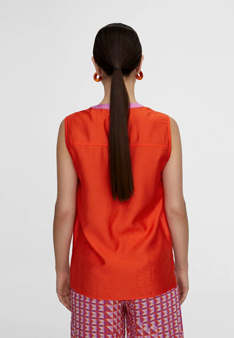 Lola Casademunt Two-tone top with vents