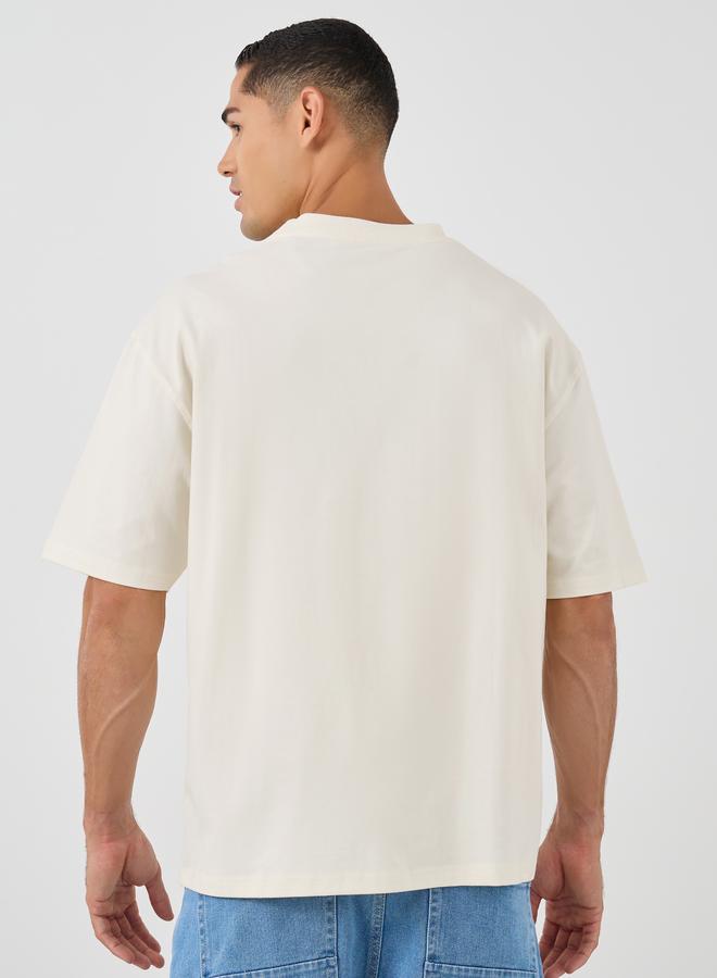 Styli Oversized Stretch Athleisure T-Shirt with Slogan Print - Image 4