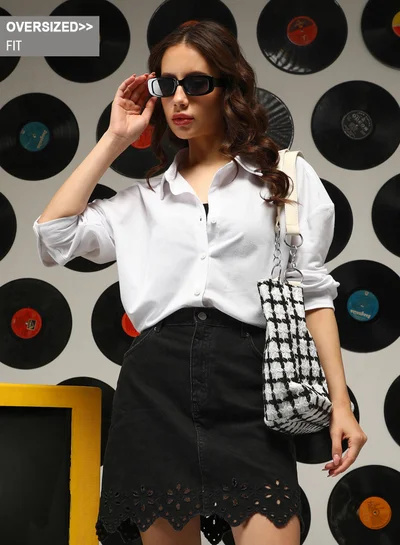 Campus Sutra Campus Sutra Women's Daisy White Solid Oversized Shirt For Casual Wear | Spread Collar | Long Sleeves | Button Closure | Oversized Shirt Crafted With Comfort Fit For Everyday Wear