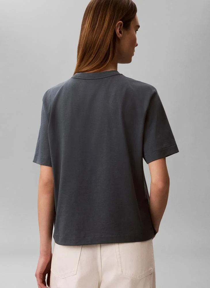 Calvin Klein Jeans  Boxy Monologo Crew Neck T-Shirt for Women | Best Price UAE