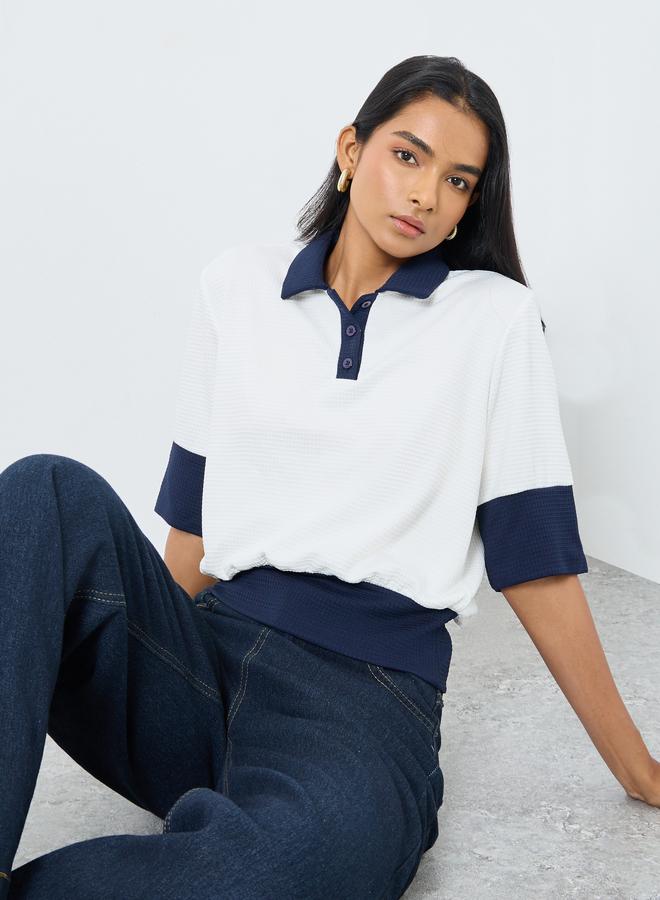 تايك تو تيشيرت بولو محبوك بنمط كتل الألوان - Image 1