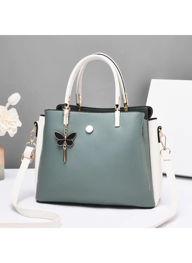 Green Leather handbag with Butterfly Keychain - A Chic Accessory for Women - Image 1